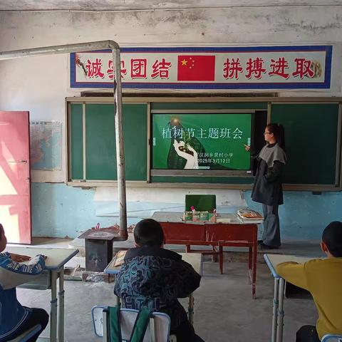 小手浇灌小树 幼苗伴随成长 ——景村小学植树节主题活动