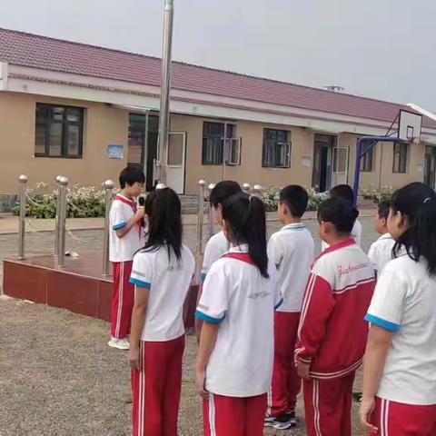 小手拉大手，创卫一起走——西桥头中心小学