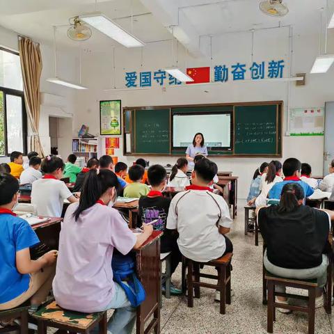 走进数学世界 享受数学乐趣（五年级实验与游戏社团活动掠影）