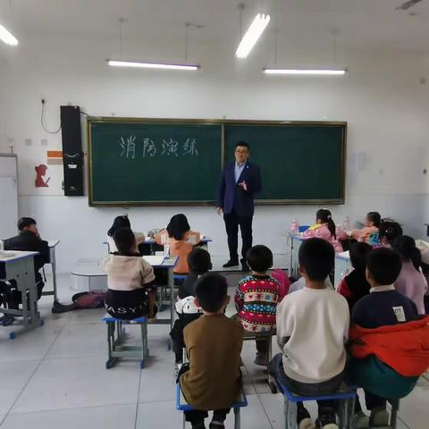 加强消防演练提高避险能力—车往镇中心校秦庄学校组织消防演练活动