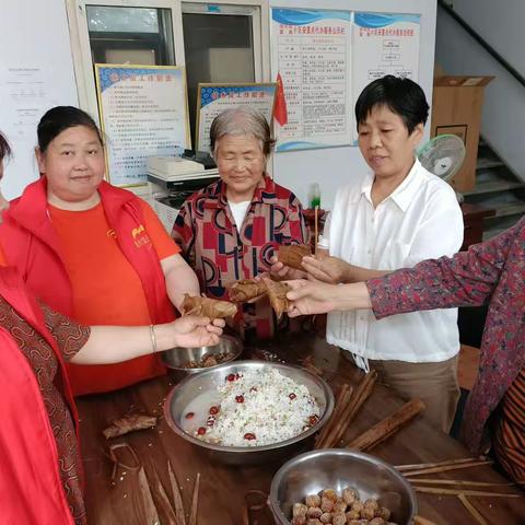 为庆祝端午佳节，6月21号滨河苑扶贫搬迁安置点举办“粽叶飘香迎端午，华蜜和谐邻里情”主题活动