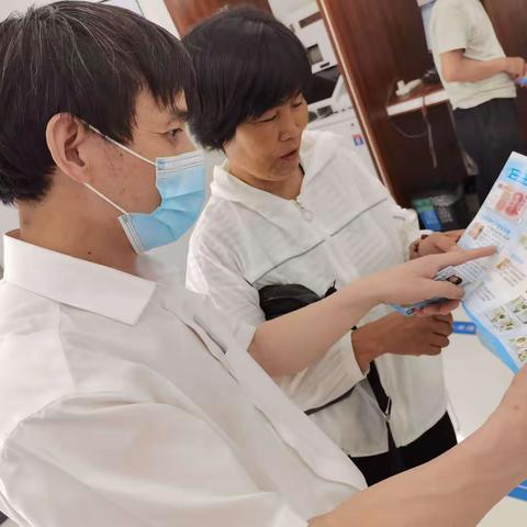 兰溪农商银行梅江支行开展“爱我亚运，畅通人民币现金使用”宣传活动