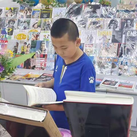 宁静小学五年一班“走进图书馆，感受书墨香”社会实践活动