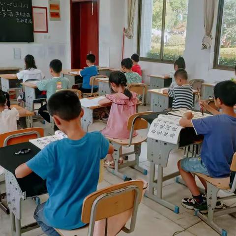 助力双减，我们在路上——县少年宫先民小学托管服务硬笔软笔书法班活动掠影