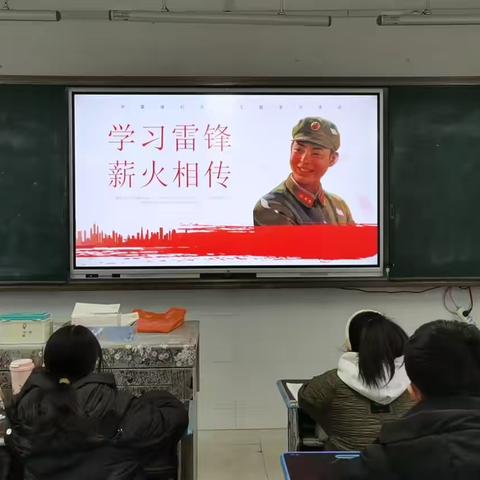 接过雷锋旗帜 传承雷锋精神——仙桃九中开展“学雷锋”主题班会活动