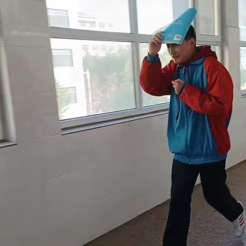 地震预防勤演习·生命安全放第一――九年级11班