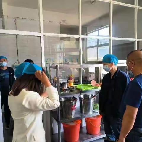 我区对中小学及幼儿园食堂食品安全工作进行评价