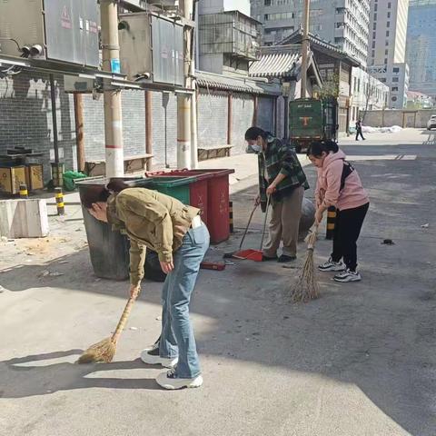 邯郸市丛台裕丰粮油贸易有限责任公司开展学习雷锋精神，打扫公司周边居民卫生活动