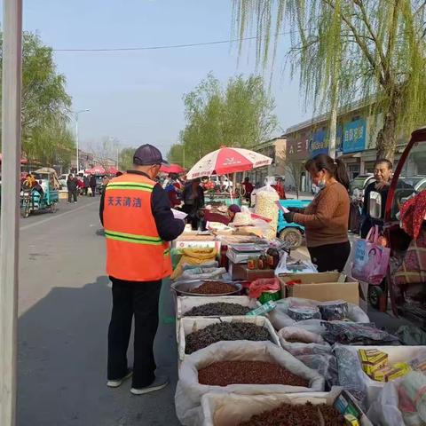 垛石街道办事处开展“门前五包赶大集”宣传活动