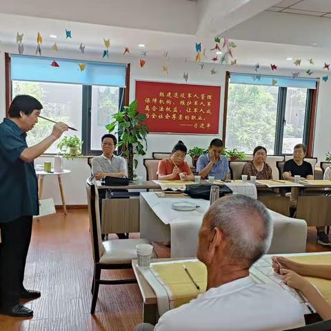 书法进社区     墨香暖民心