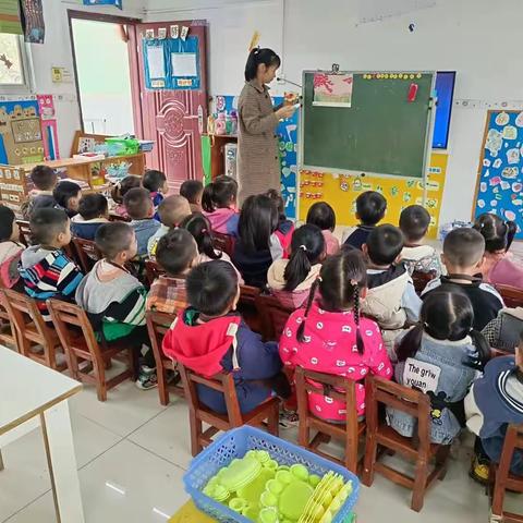 校椅镇东圩育苗幼儿园中班半个柠檬美术《樱花树下》