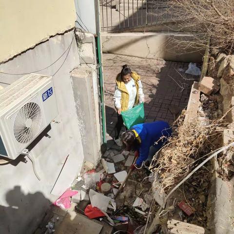 平山街道学院社区乱堆放清理行动