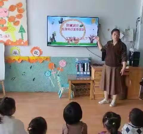 五莲县同俗幼儿园开展“5.12地震逃生演练”教育活动