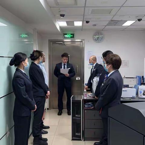 安化支行小西天支行开展防火应急预案演练模拟演练