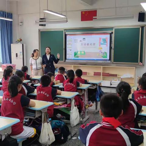 九龙坡区铁马小学校四年级五班“大手拉小手劳动一起走”家长进课堂活动