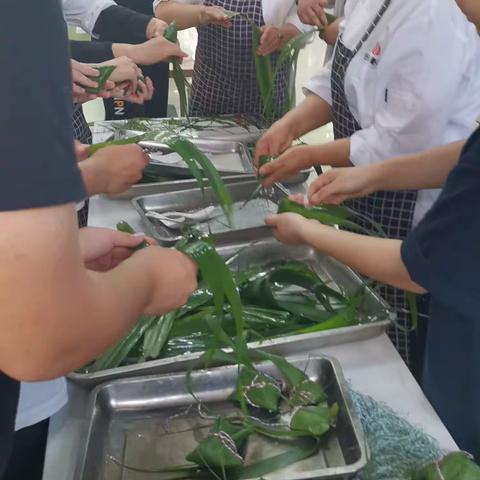 粽叶飘香江海大，巨百餐饮“粽”是情