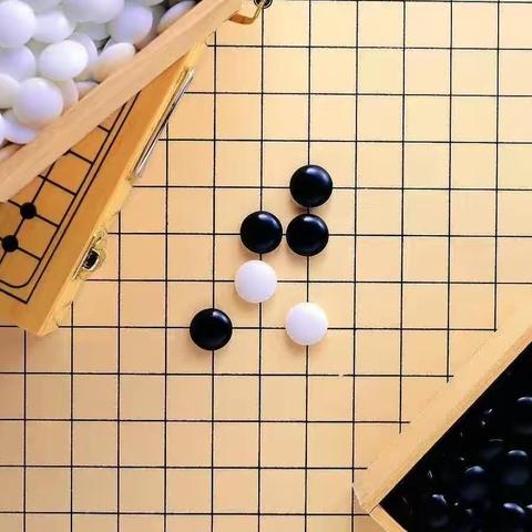 棋盘上的艺术--地庄小学五子棋兴趣小组纪实