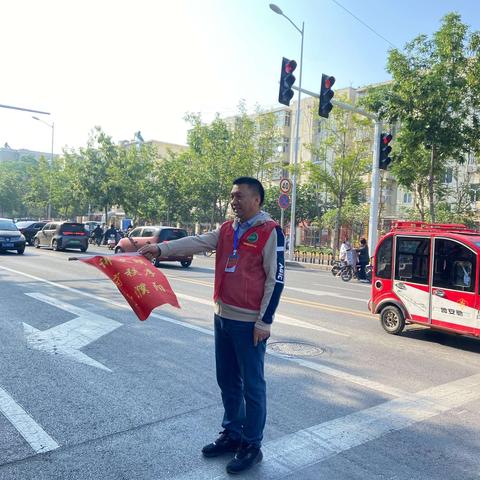 交通文明，安全出行—濮阳市油田第四小学开展“文明出行”志愿服务活动