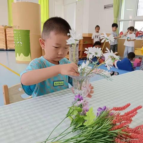 元禾幼儿园中二班生活主题整合课程《“幼”见花开》