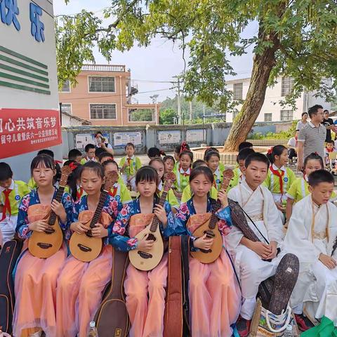 美育帮扶暖童心  同心共筑音乐梦——2023年章贡区“圆梦蒲公英”   关爱留守儿童暨庆六一公益捐赠