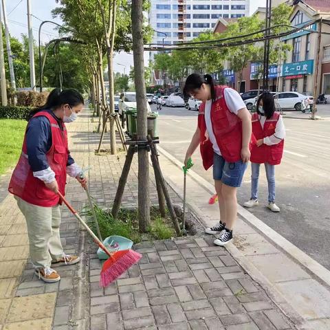 广济社区开展道路卫生环境整治行动