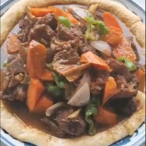周晓刚老师作品《新疆风味馕包肉》