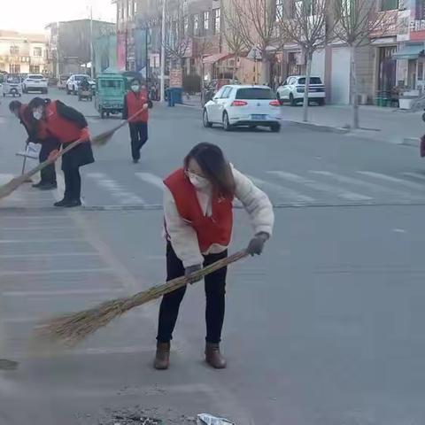 喜除虎尘，净迎新兔。—河流镇中心小学教师清理校园及周边环境喜迎新年