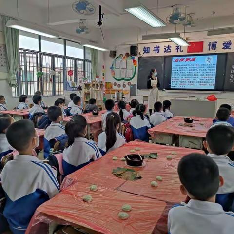 春日青团学生忙，碧玉团圆满屉香 ———镇南小学“荷塘悦舍”开展清明文化传承活动