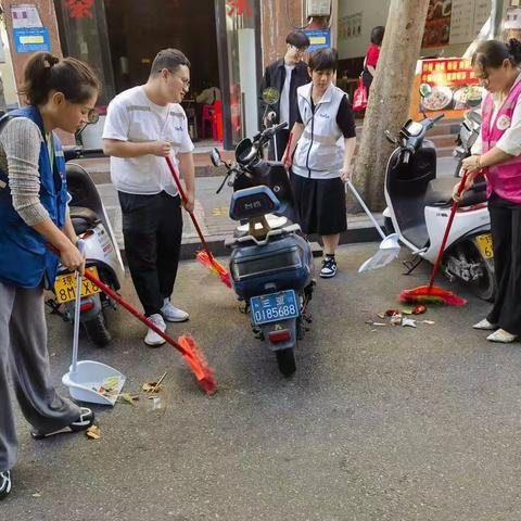 建设街社区联合包点单位区政府办开展“五爱”环境卫生大扫除活动