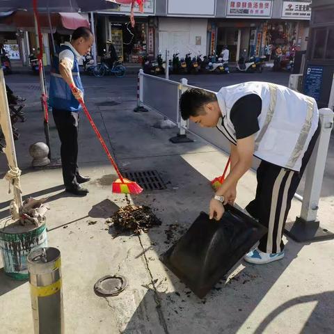 建设街社区联合包点单位区政府办开展“五爱”环境卫生大扫除活动