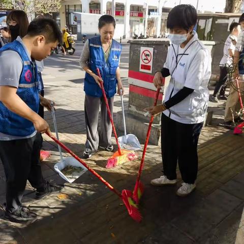 建设街社区联合包点单位区政府办开展“五爱”环境卫生大扫除活动