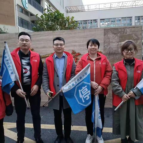 风雨护学岗，暖心护成长——博才白鹤小学西校区2106班护学岗在行动