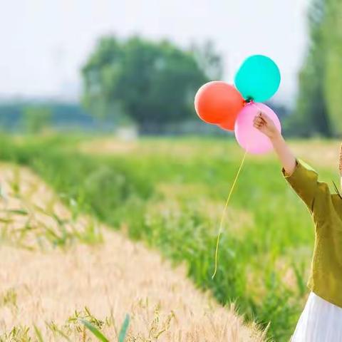 风吹麦浪起 放飞童年梦