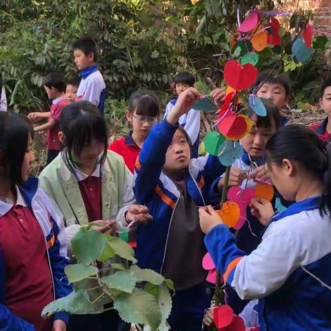 童心喜迎二十大  植树添绿正当时——白土镇中心小学开展植树节主题活动