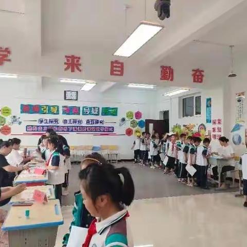 “玩中考，考中乐，乐中长”科左后旗实验小学一、二年级期末游考