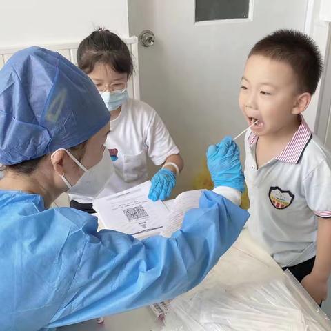 菊泉实验幼儿园“严格防控，守护健康”