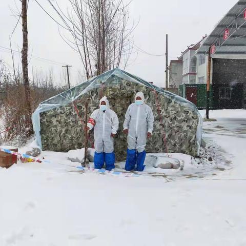 风雪中的坚守  惟愿“疫”退民安