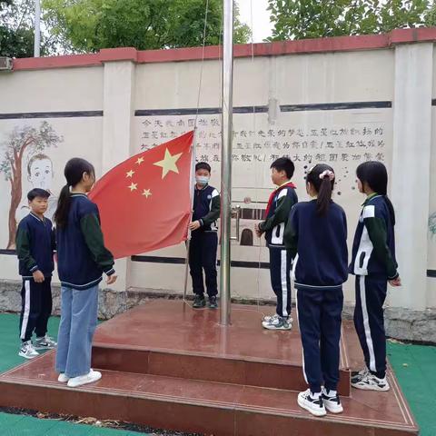 前吕楼小学举行“中国少年先锋队建队日”活动——少先队员入队仪式