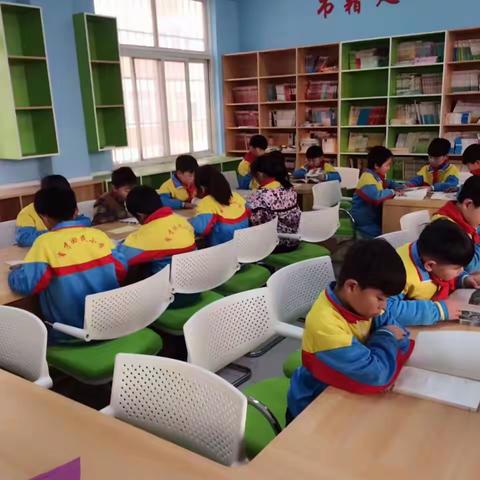 "阅读丰富人生，书香滋润校园"育才回族小学三年级读书活动